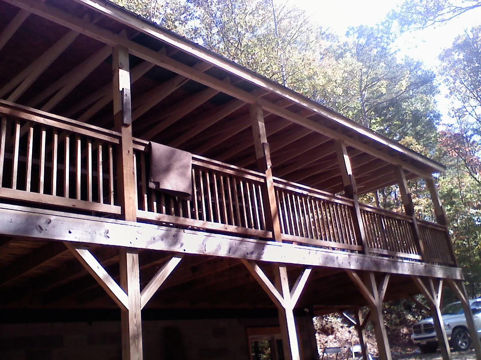 Timber framing under a new elevated porch and deck — Roof Leak Repair in California by Roofing Brothers